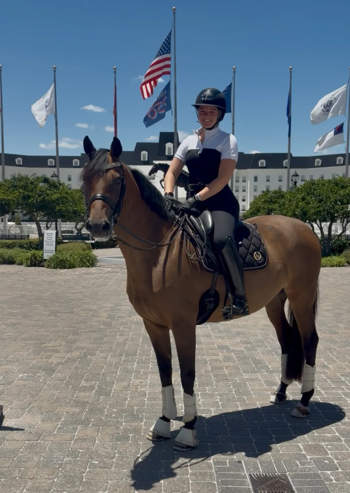 Caroline mounted on her horse at World Equestrian Center Ocala